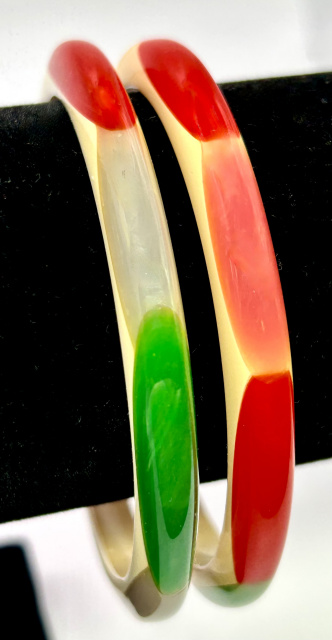 Shultz cream narrow bakelite bangles with rainbow colors of oval dots